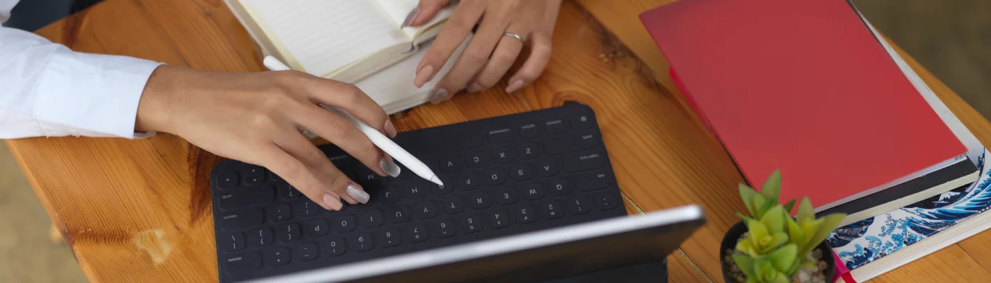 high-angle-view-people-using-laptop-table