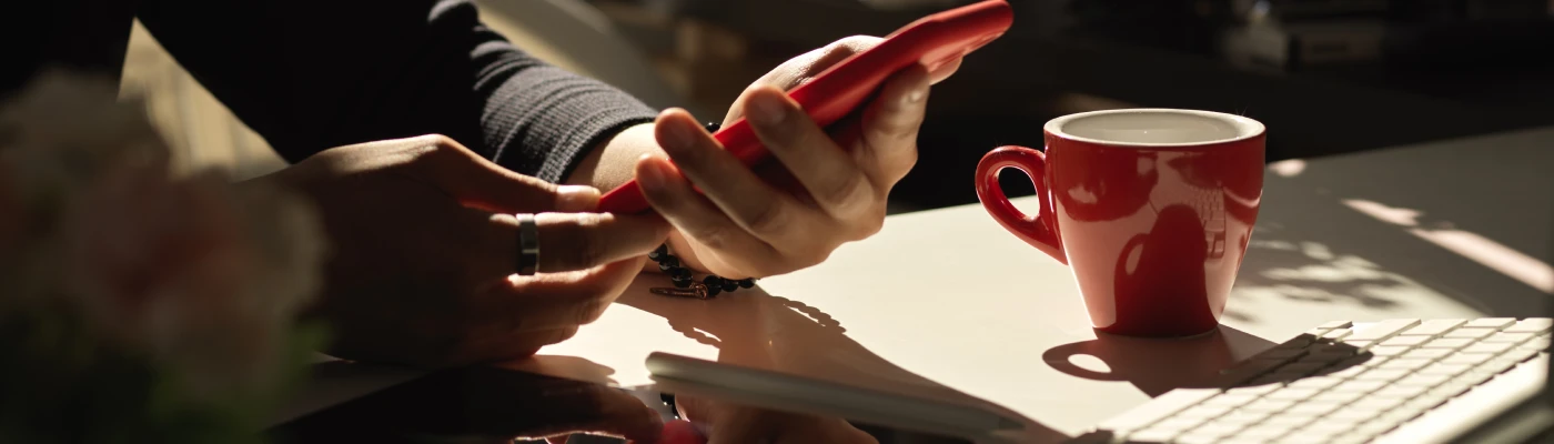 midsection-woman-using-mobile-phone